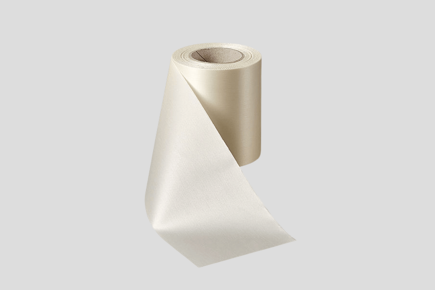 En rull Gavebånd stof med tryk Design selv av JM Band® på grå bakgrunn.