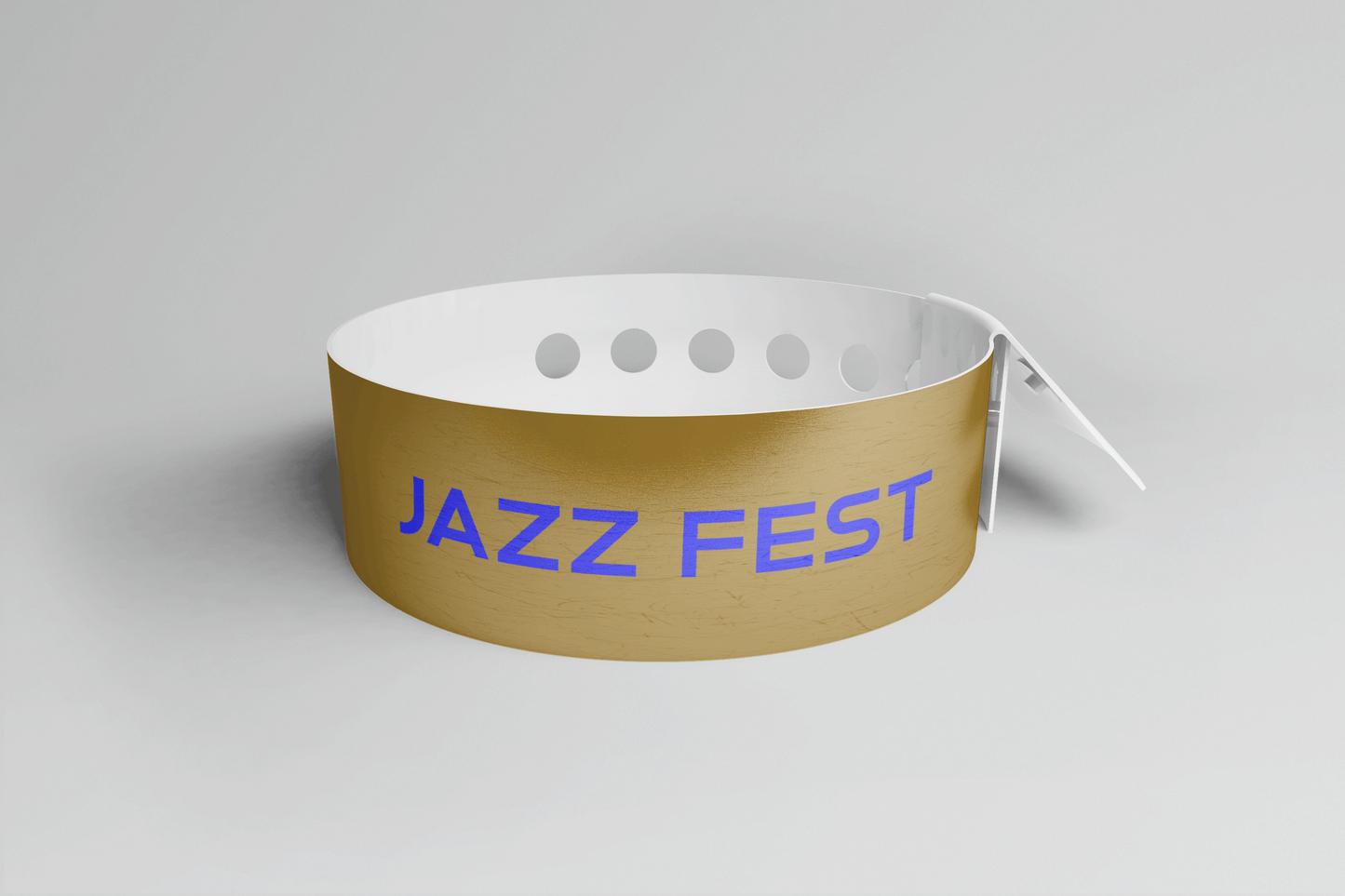 Et gull Plastarmbånd L-print Design selv med ordet jazzfest på, med PVC-materiale for holdbarhet, av JM Band®.
