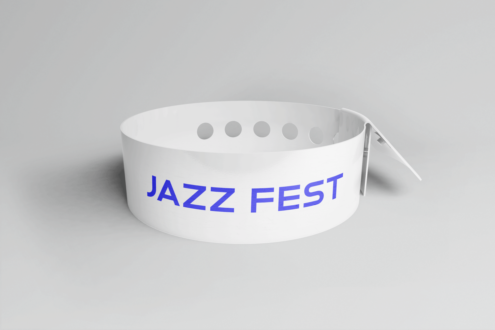 Et hvitt Plastarmbånd L-print Design selv med ordet jazzfest på, laget av JM Band®.
