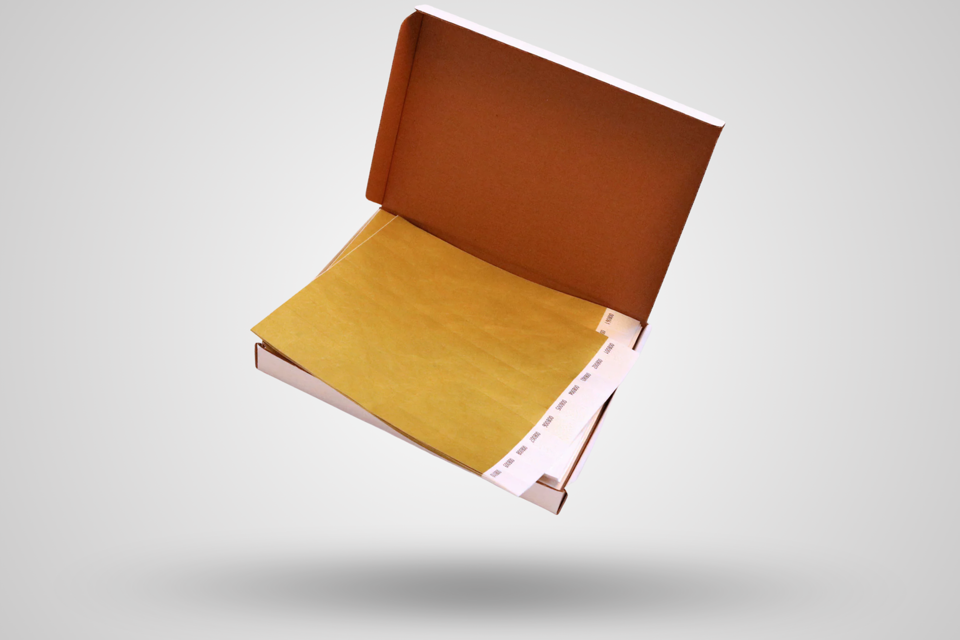 Et foto av Kasse med 1000 papirarmbånd fra JM Band®. Kjøp Papirarmbånd i Bronse her.