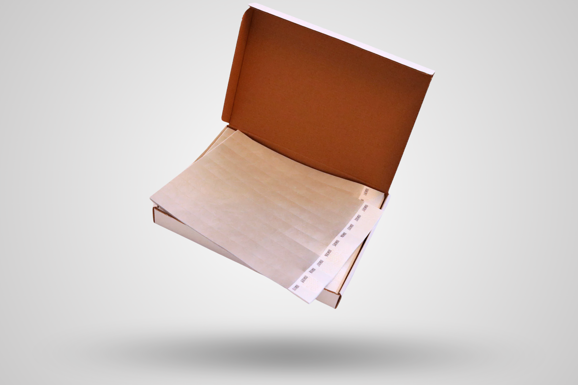 Et foto av Kasse med 1000 papirarmbånd fra JM Band®. Kjøp Papirarmbånd i Grå her.