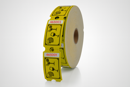En rulle med gul tape med design på som kan løses inn som JM Band® drikkebilletter eller billetter.