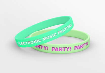 To Glow-in-the-Dark Silikon Armbånd med ordene elektronisk musikkfestivalfest fra JM Band®.